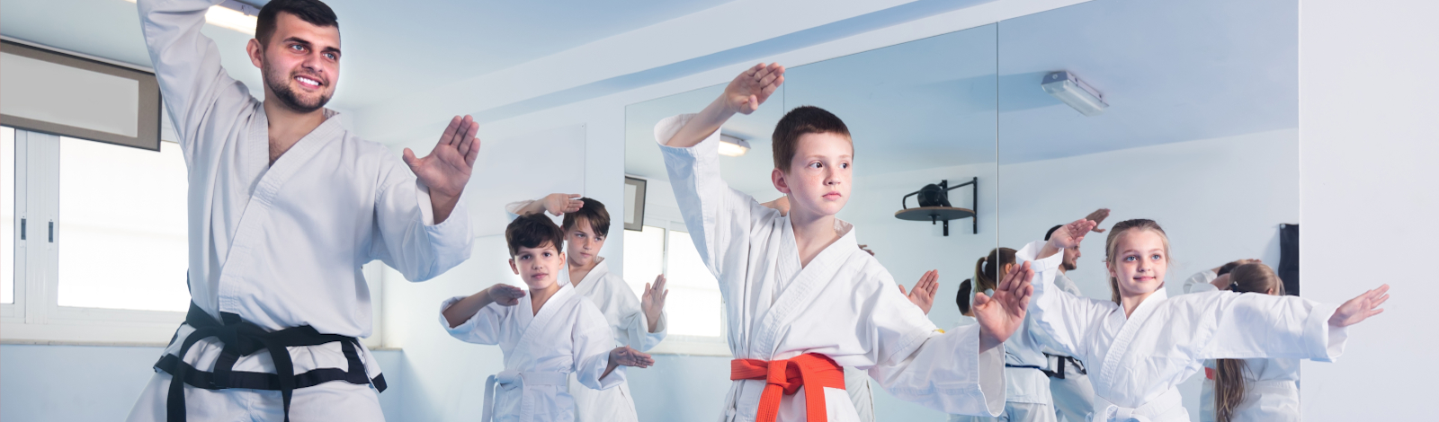 Karate classroom with teacher and students